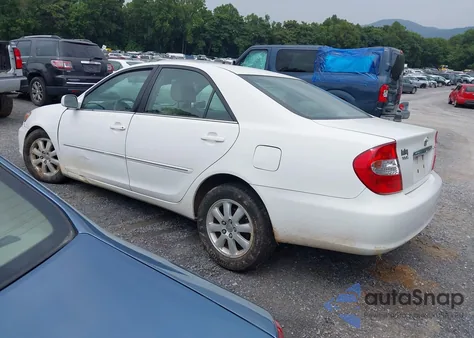 2004 Toyota Camry Xle z USA, uszkodzony, nr VIN 4T1BE30K44U377647